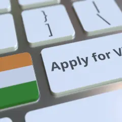 Teclado con la bandera de India y la tecla "Apply for Visa". Averigua el precio visado India para tu viaje.